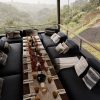Lanai with Resource Furniture Flex sofa, Resource Furniture Passo transforming coffee tables, pony wall top made of black Richlite and topped with an Ipe/stainless railing installed by Hawaii Offgrid. Glasses are by Velux. They nest and can be used for everything from wine to coffee. Napkins were made by Melissa Bruck from Home Depot drop-cloths. The runner is from MagicLinen on Etsy. Pillows are made from off-cuts by Oliver Yaphe. Antique silverware bought on Etsy.